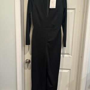 Naked wardrobe wide leg, V-neck jumpsuit. New with tags size large. Black.